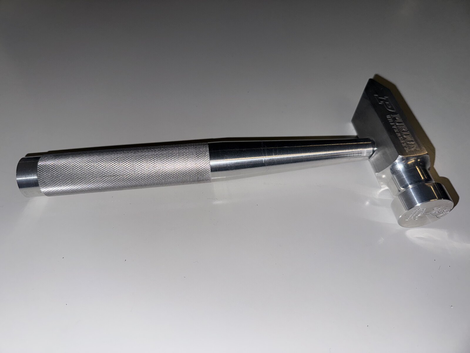 Machined aluminum hammer from an earlier lab