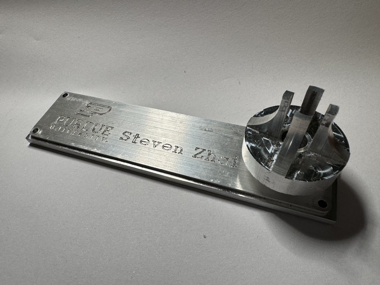 Engraved Purdue nameplate and turned part