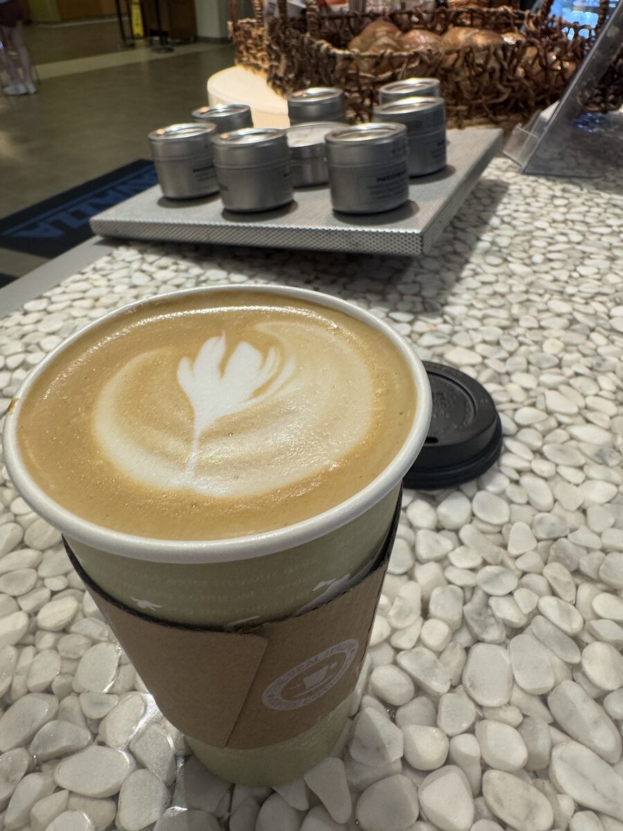 Feather pour in a tall to-go cup