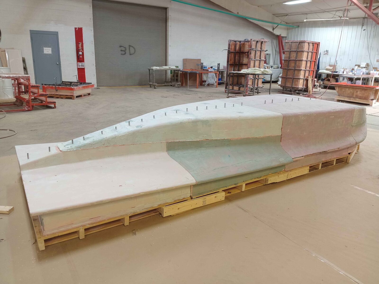 Glued foam plug sections on a pallet